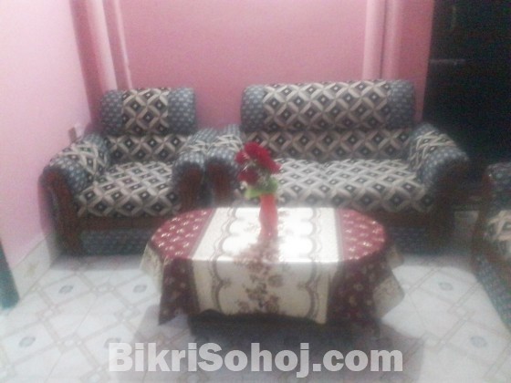 Sofa set with tea table and flower top